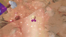 a girl with blonde hair and purple pants is kneeling down with her arms in the air