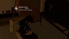 a screenshot of a video game shows a person sitting in a chair