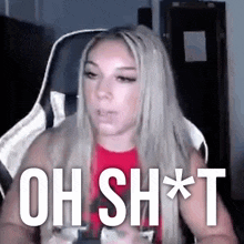a woman sitting in a chair with the words oh sh * t written on the screen
