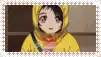 a girl in a yellow jacket with a hood is holding a cup of coffee .