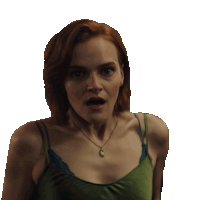a woman wearing a green tank top and a necklace looks surprised