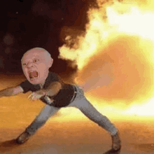 a man with his mouth open is standing in front of an explosion