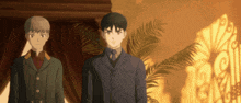 a man in a suit and tie stands next to another man