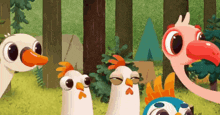 a group of chickens and a flamingo are standing next to each other in a forest