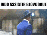 a man in a blue suit and hat is walking down a street with the words indo assistir blowjogue above him .