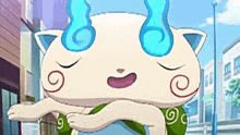 a cartoon cat with blue horns and a green shirt is standing in a city street .