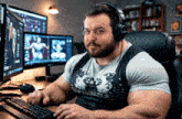 a man wearing headphones is typing on a keyboard and has a shirt that says ' dwarvladrildur '
