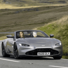 Gigi And Paloma In The Aston Martin Tinder GIF - Gigi And Paloma In The Aston Martin Tinder GIFs