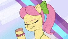 a cartoon of a pony with a bow on her head