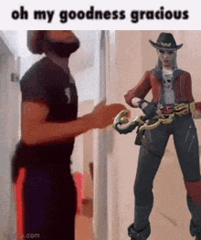 a man and a woman are standing next to each other in a hallway holding a snake .