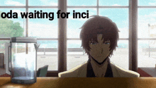 a man sitting at a table with a pitcher of water next to him and the words oda waiting for inci above him