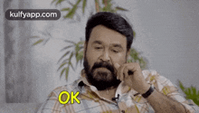 ok mohanlal gif agreeing accepting
