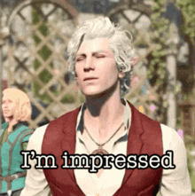 a man with white hair is wearing a red vest and a white shirt and says i 'm impressed .