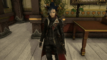 a woman in a black and red outfit stands in a room