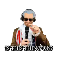 a man wearing headphones and sunglasses holds a microphone with the words is this thing on below him