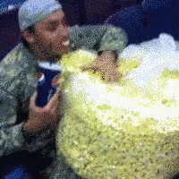 munching on popcorn bag