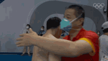 hug xie siyi china synchronized diving team nbc olympics embrace