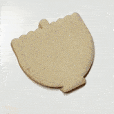 a person is piping a cookie with a white bag