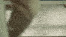 a close up of a person 's feet on a counter .