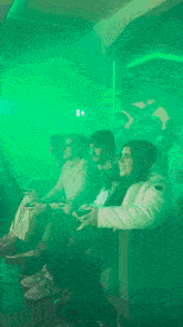 a group of people playing a video game with the word shagarita on the bottom right
