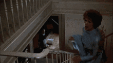 Rushing Chris Macneil GIF - Rushing Chris Macneil The Exorcist GIFs