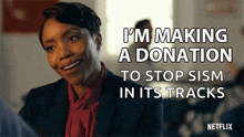 a woman is making a donation to stop sism in its tracks