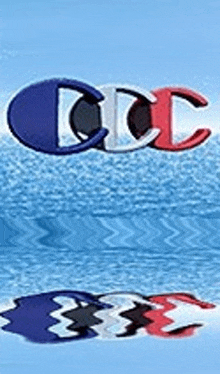 a blue , white , and red champion logo is reflected in the water .