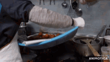 a person is preparing food in a kitchen with the words made in animatica on the bottom
