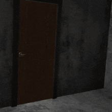 a man holding a gun is standing in a doorway