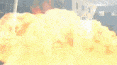a building is on fire and smoke is coming out of the windows