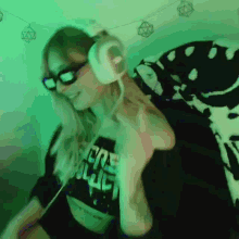 a woman wearing headphones and a crop top that says crew