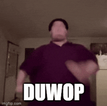 a man is dancing with the word duwop written on his chest