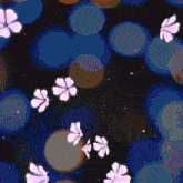 a seamless pattern of pink flowers and blue circles on a black background