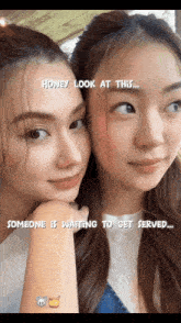 two girls are posing for a picture with the caption " honey look at this "