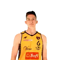 a man wearing a yellow jersey that says trefl