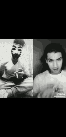 a man with a mask on his face is smoking a cigarette and a man with long hair is smoking a cigarette .