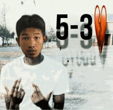 a man in a white shirt is giving the middle finger in front of the number 5 3