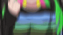 a blurry image of a person 's torso with a green light behind it