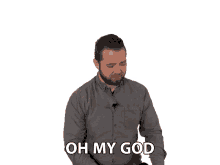 a man in a grey shirt says " oh my god "