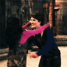Selena Gomez Hug GIF - Selena Gomez Hug Gregg Sulkin GIFs