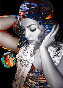 a woman wearing a colorful headband with the word freedom on it