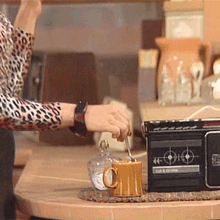 Mixing Coffee Peggy Bundy GIF - Mixing Coffee Peggy Bundy Katey Sagal GIFs