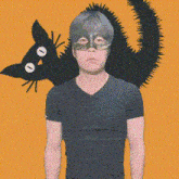 a man wearing a mask stands in front of a black cat on an orange background