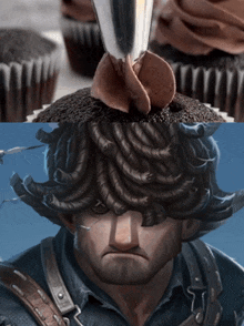 a cupcake with chocolate frosting on top of it and a man with dreadlocks on his head
