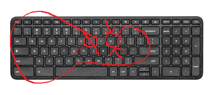 a black keyboard with a red outline around the keys