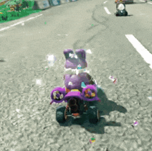 a purple teddy bear is driving a purple atv on a dirt road in a video game .