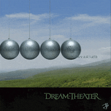 a dream theater album cover shows a row of balls hanging from strings