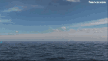 a rocket is being launched into the ocean with the website financer.com in the corner