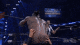 a wrestling match is being shown live on the aew tbs channel