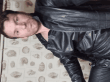 Feing Lusty In Leather GIF